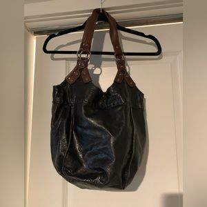 The Sak leather bag black with brown straps